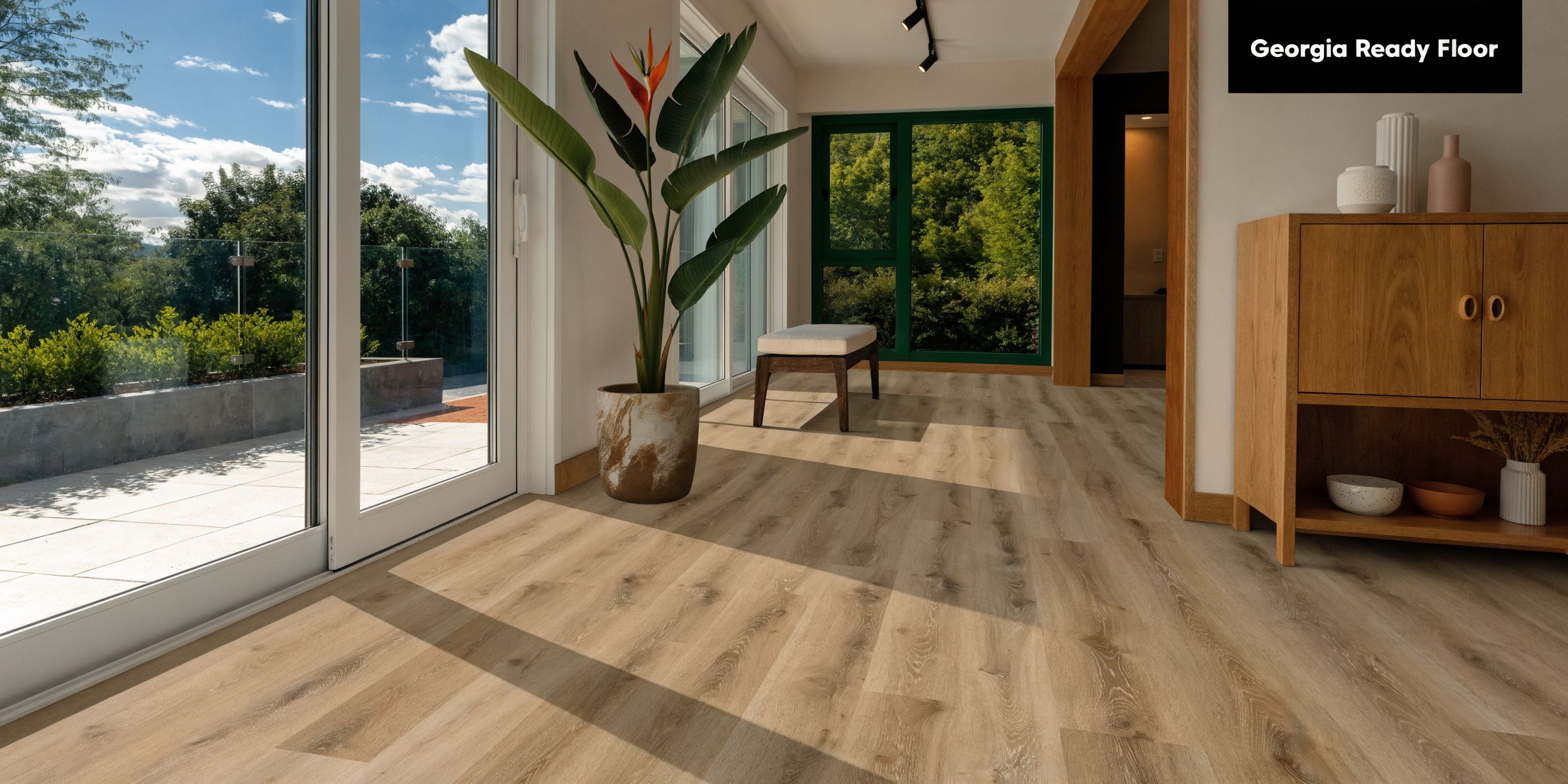 Bright, modern living space featuring high-quality Georgia Ready Floor wood-look vinyl planks in a sunny room.