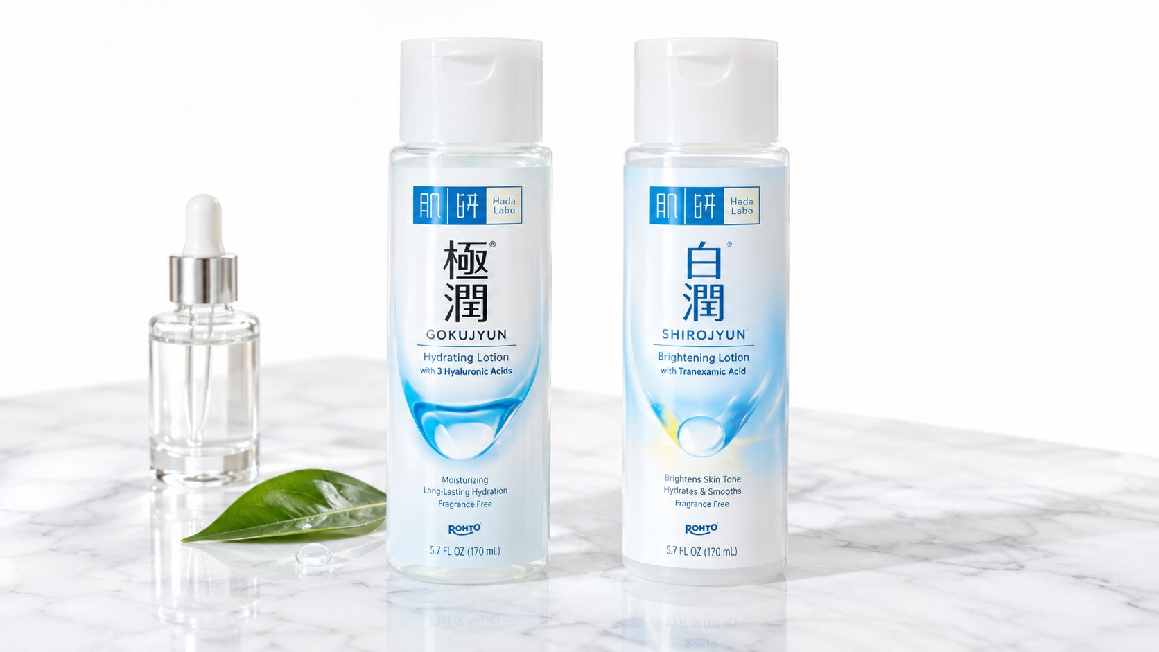 Two Hada Labo lotion bottles, Gokujyun and Shirojyun, on a marble surface next to a dropper bottle.