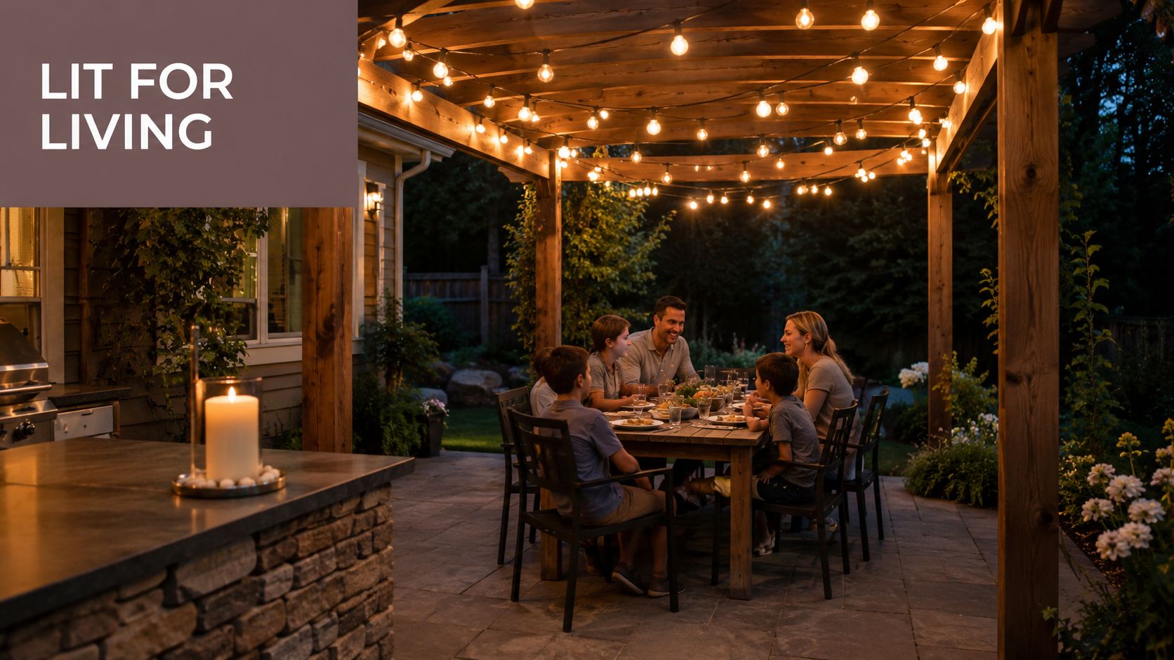 A happy family enjoys an outdoor dinner under a gazebo illuminated by hanging string lights at night.