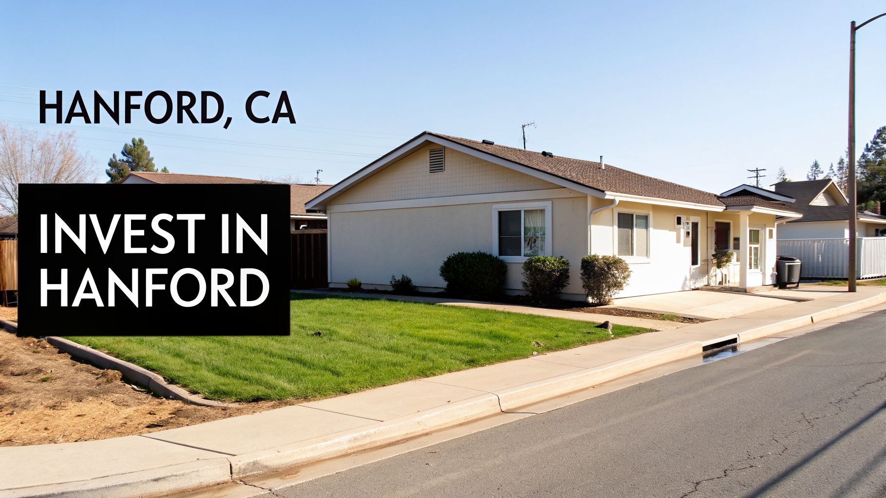 Residential street in Hanford, CA, with houses, green lawns, and a black box promoting 'Invest in Hanford'.