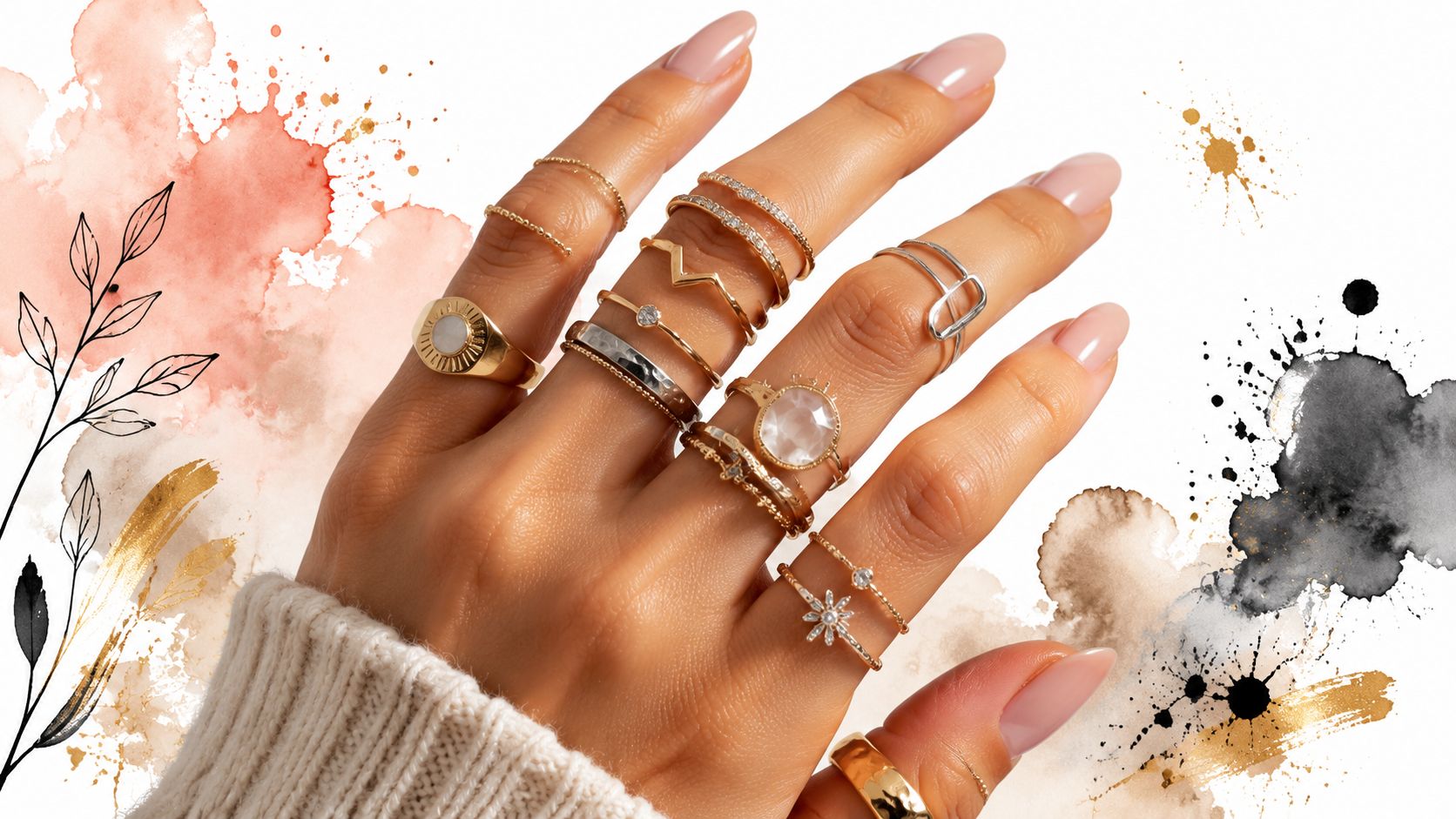 A hand adorned with numerous gold rings set against an artistic background with watercolor splashes.