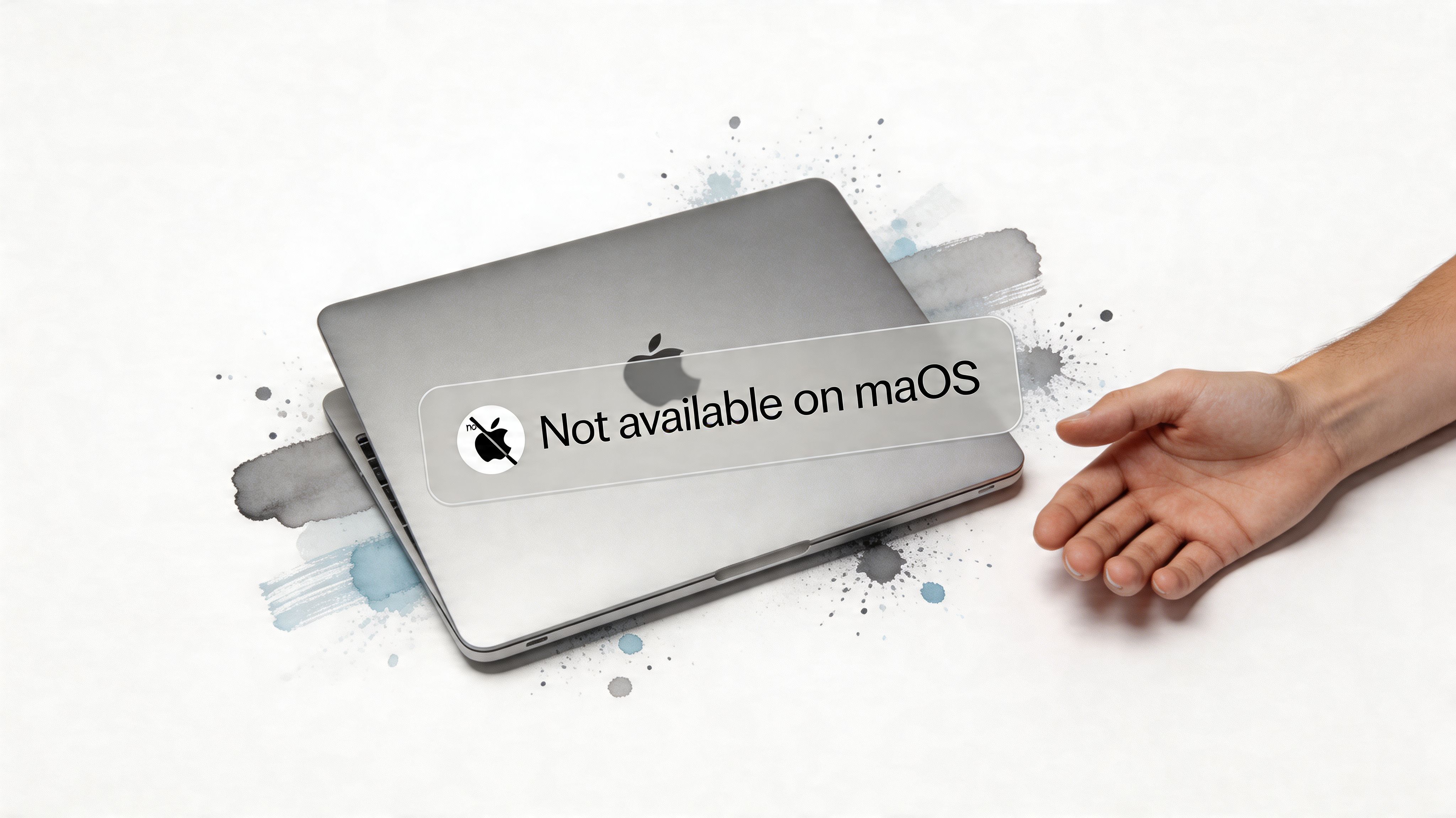 A silver MacBook laptop resting on a white surface with a digital notice stating it is not available on macos.