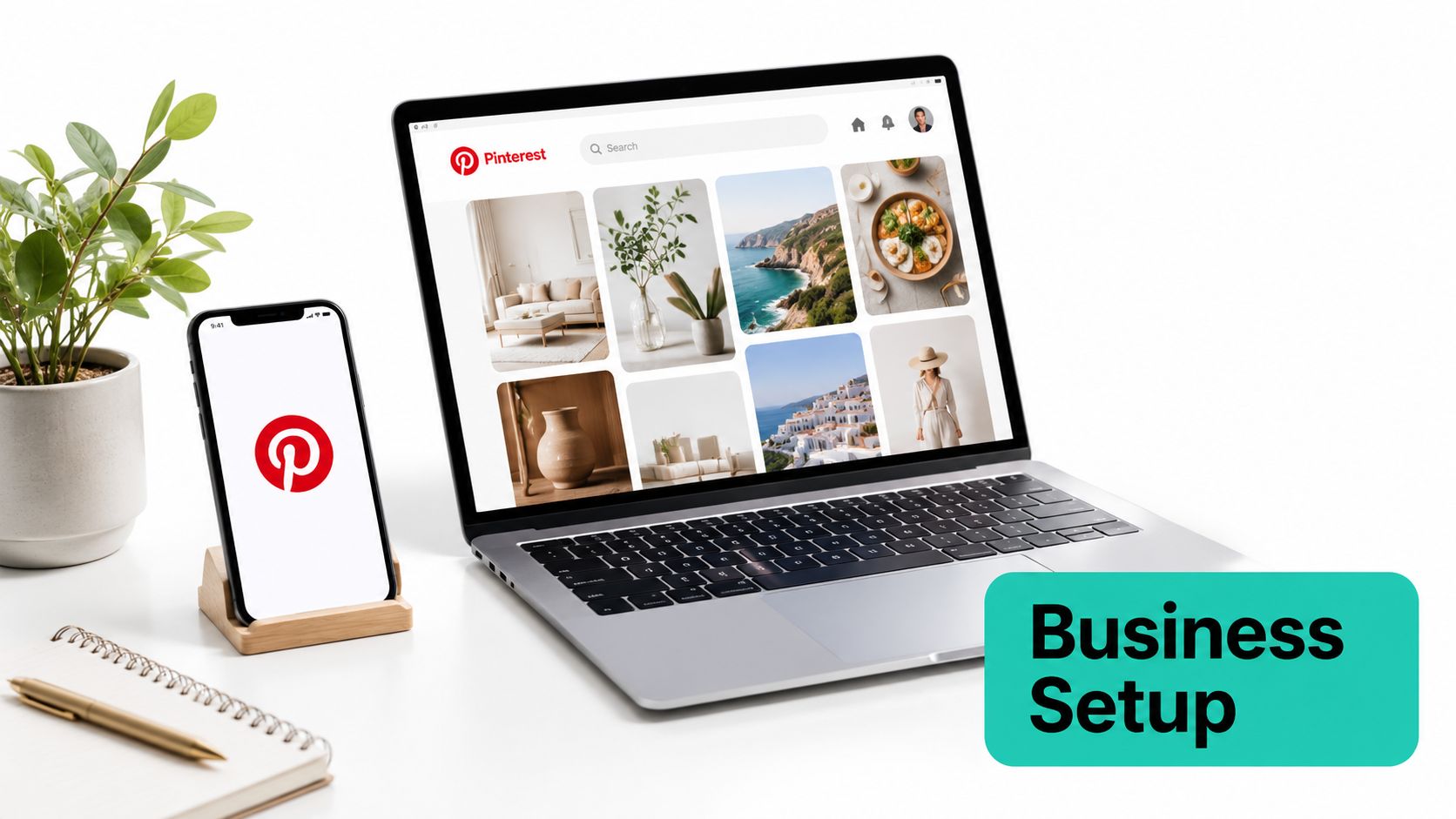 A modern workspace featuring a laptop displaying Pinterest and a smartphone with the Pinterest app icon.