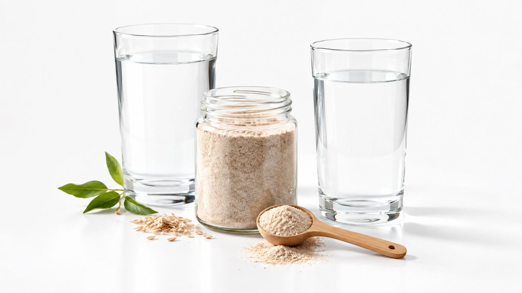 A glass jar of psyllium husk powder with a wooden spoon, glasses of water, and some oats.