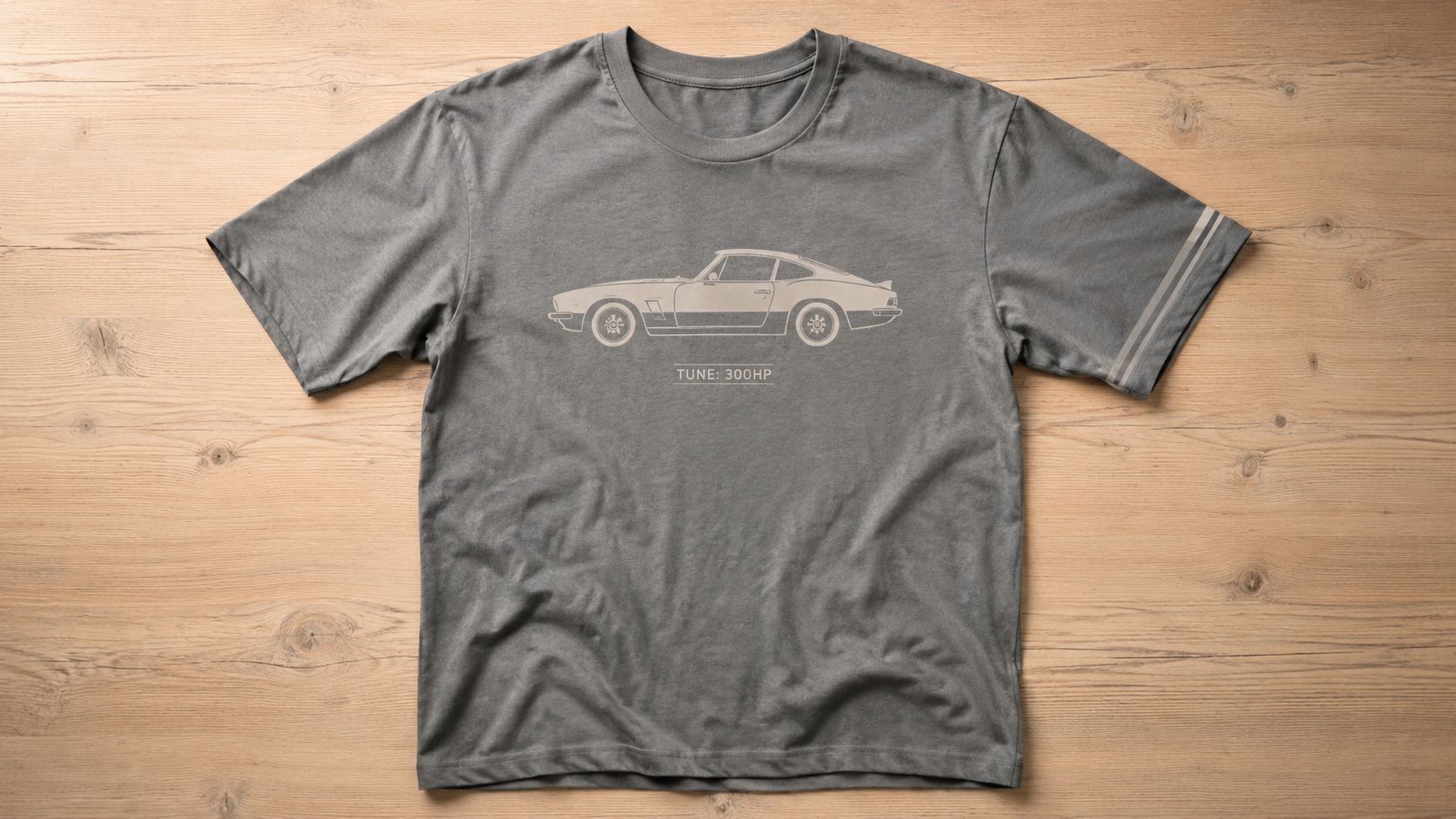 A grey t-shirt featuring a graphic illustration of a vintage sports car and the text Tune 300HP.